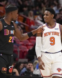  巴特勒三双热火加时险胜尼克斯  